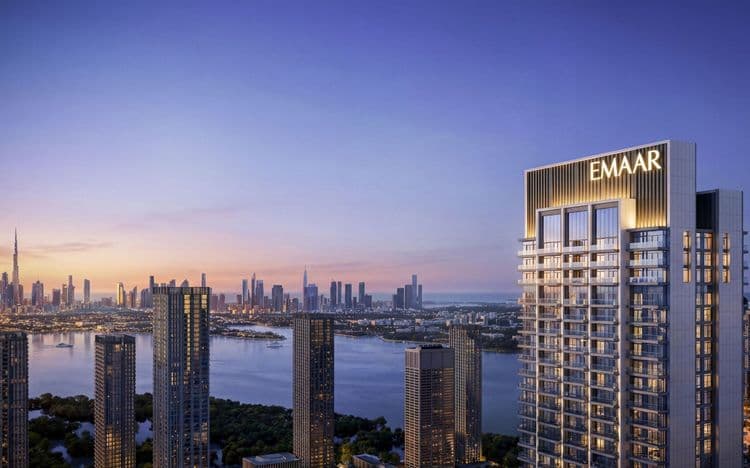 Valia tower by Emaar at dusk with Dubai Creek and the Downtown Dubai skyline